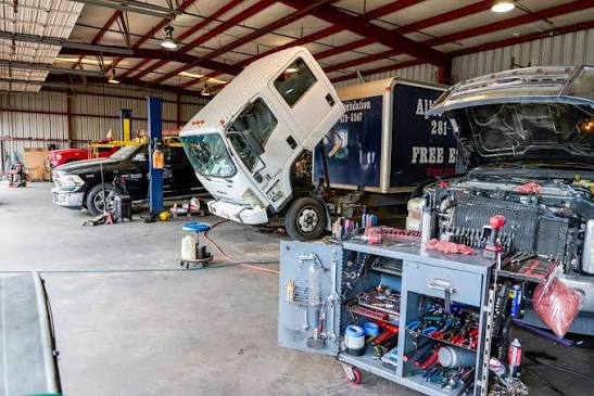 Heavy equipment in a commercial maintenance bay